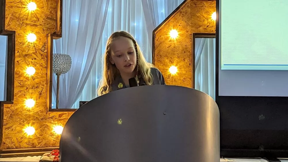 Competition winner Zena reads her story at the Black Beauty book launch.