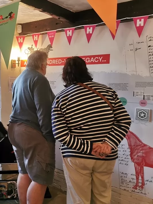 People looks at the displays inside Anna Sewell House.