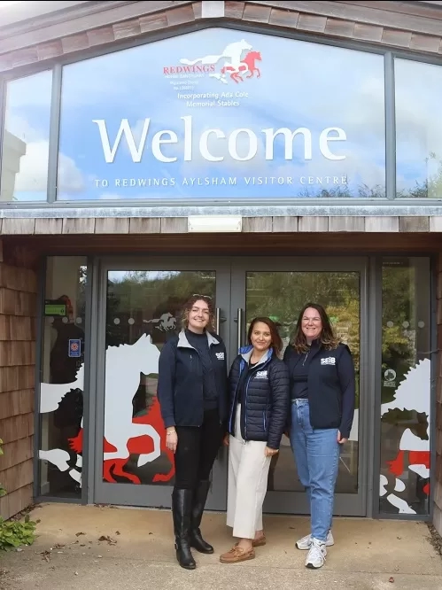 The SEIB team stand outside the entrance to Redwings Aylsham 