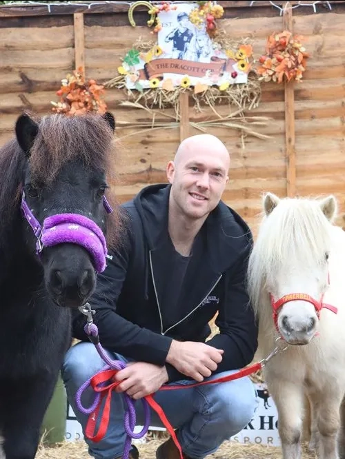Sam Dracott with two Redwings ponies